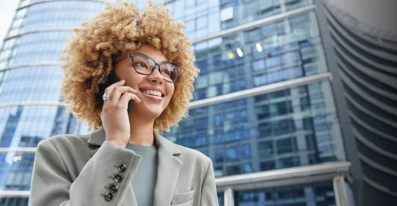 Woman enjoying wireless connection on her phone